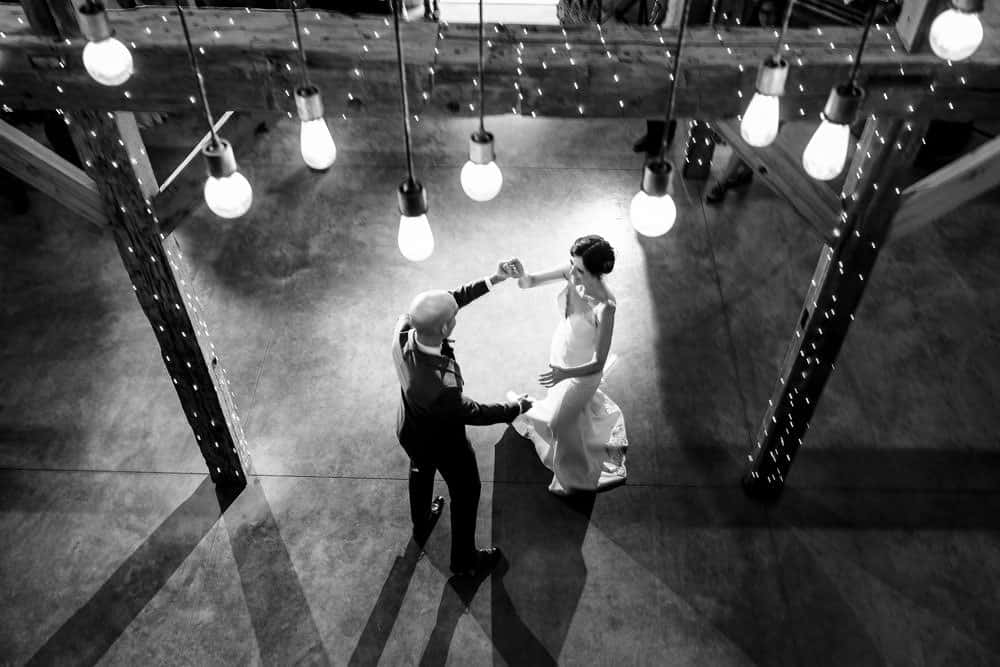 overhead photos of bride and groom's first dance at Wren's Roost Barn